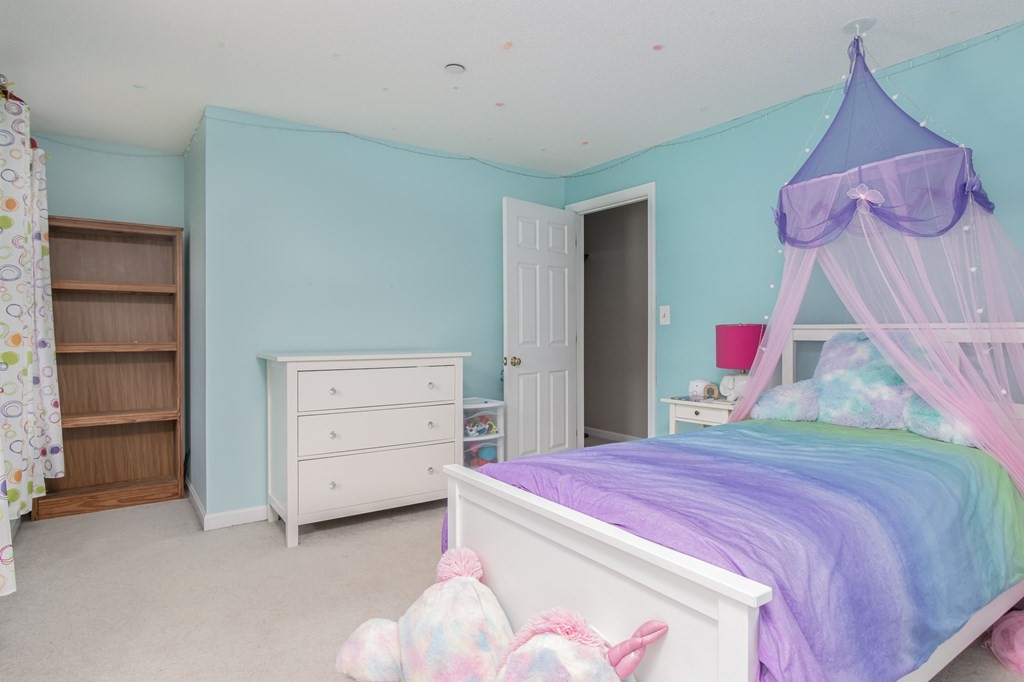 19 Hammond Farm Road Haverhill, MA 01832 - Photo 25 of 42 a bedroom with a bed and a dresser