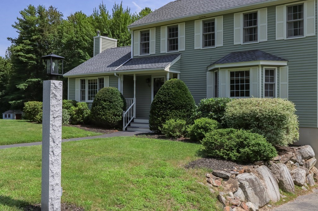 19 Hammond Farm Road Haverhill, MA 01832 - Photo 3 of 42 a front view of a house with a yard