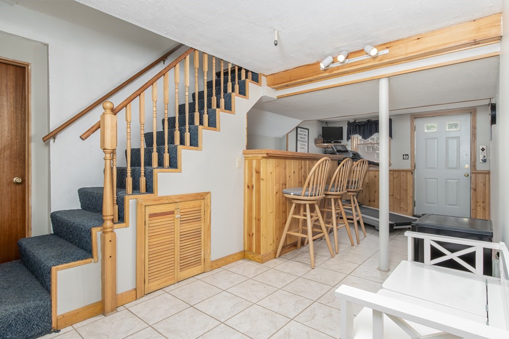 19 Hammond Farm Road Haverhill, MA 01832 - Photo 31 of 42 a view of a livingroom with furniture and staircase
