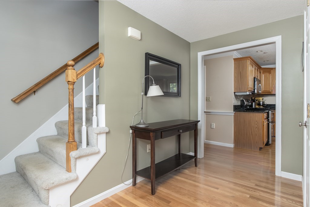 19 Hammond Farm Road Haverhill, MA 01832 - Photo 6 of 42 a view of living room with furniture and wooden floor