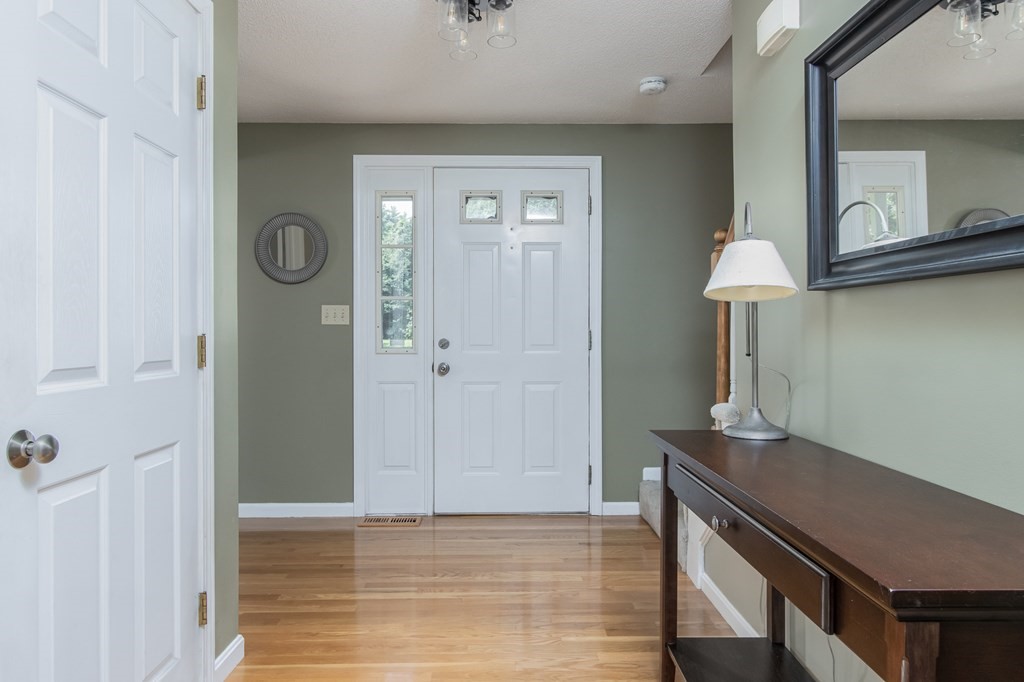 19 Hammond Farm Road Haverhill, MA 01832 - Photo 8 of 42 a view of a livingroom with a workspace