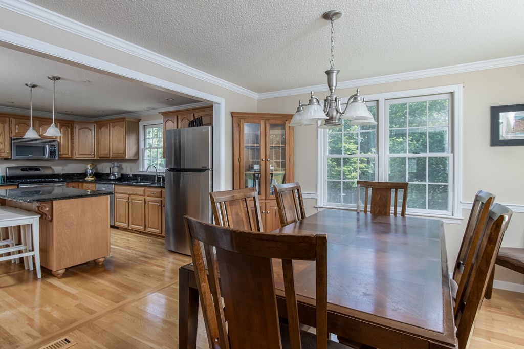 19 Hammond Farm Road Haverhill, MA 01832 - Photo 9 of 42 a view of a dining room with furniture window and outside view