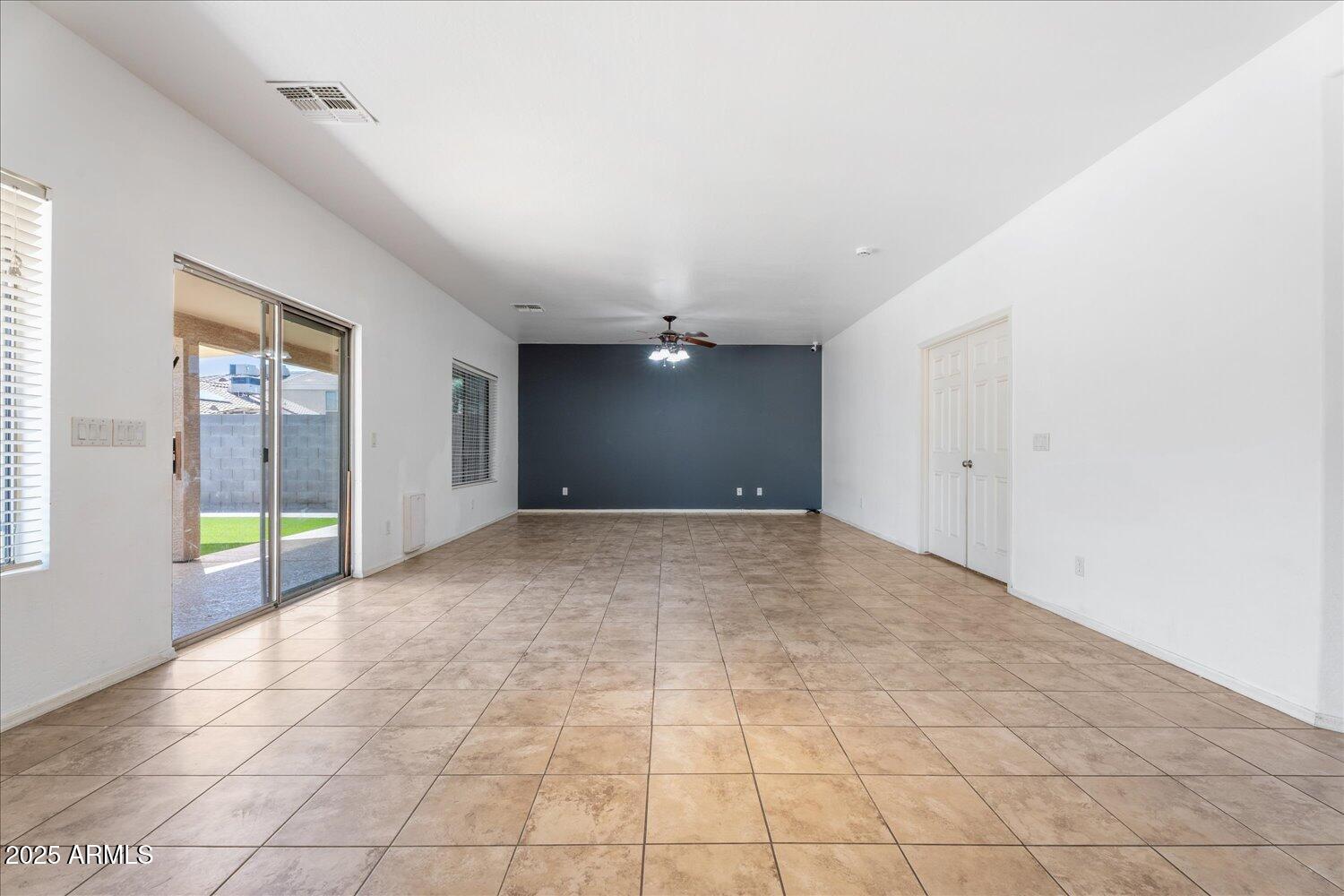 12745 West Calavar Road El Mirage, AZ 85335 - Photo 20 of 56 a view of an empty room with a window