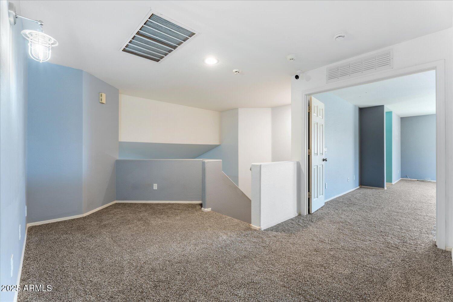 12745 West Calavar Road El Mirage, AZ 85335 - Photo 41 of 56 a view of an empty room with a window