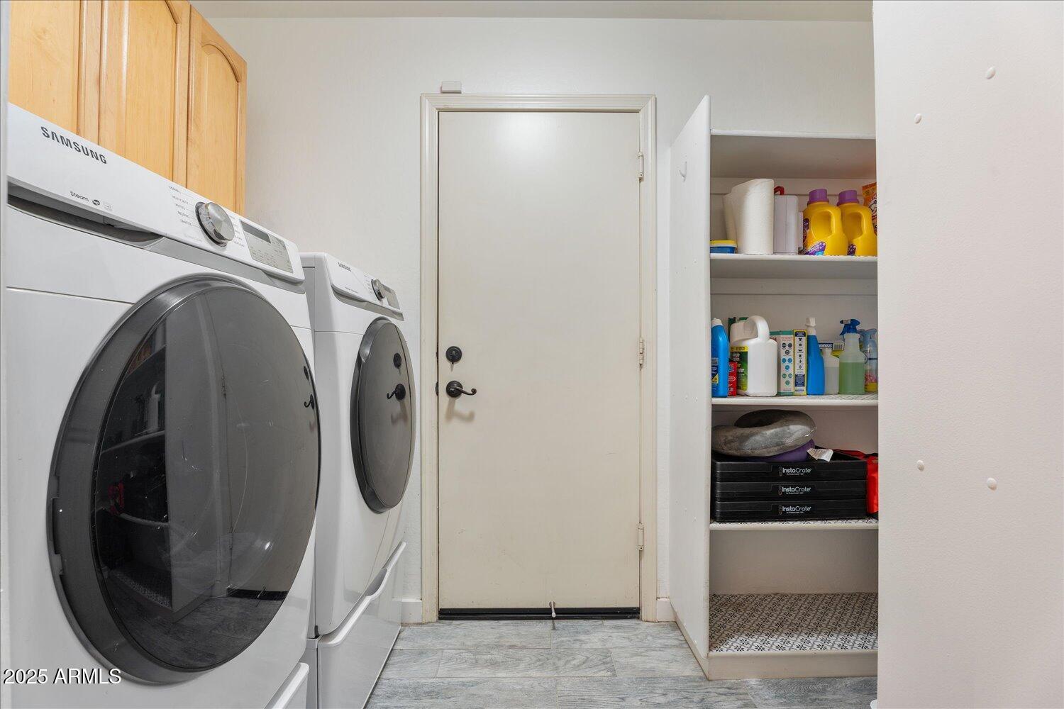 12745 West Calavar Road El Mirage, AZ 85335 - Photo 42 of 56 a utility room with dryer and washer