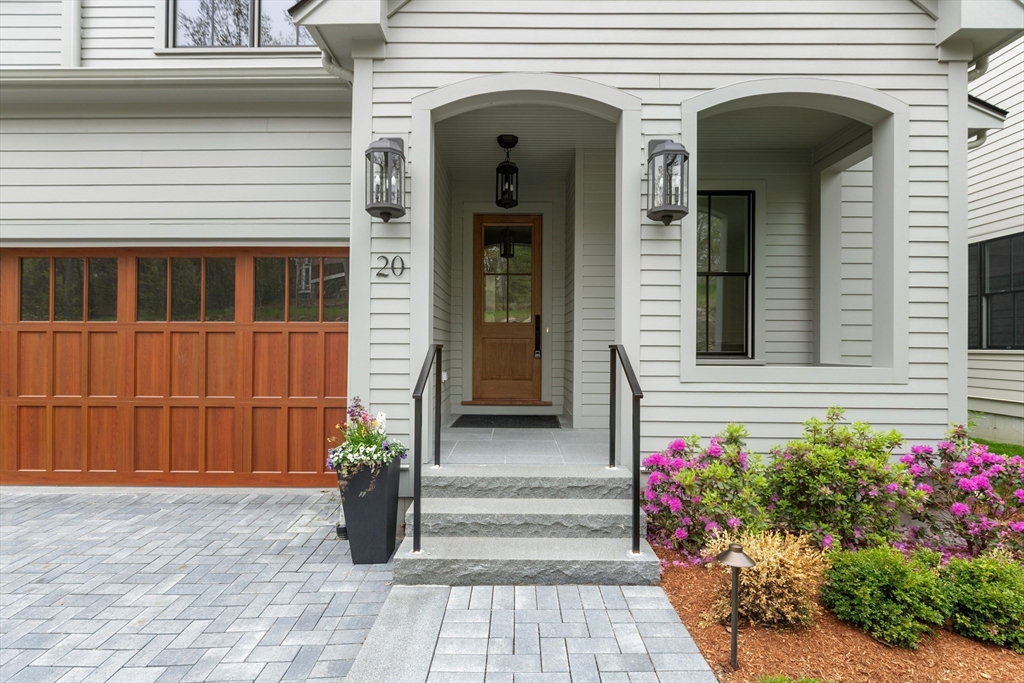 20 Common Court, Unit 20 Lexington, MA 02421 - Photo 3 of 27 a front view of a house