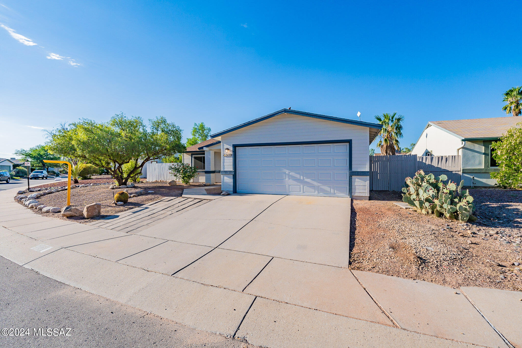 2690 West Sunset Road Tucson, AZ 85741 - Photo 3 of 33 a house view with a outdoor space