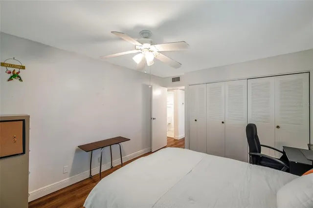 a bathroom with a toilet and a bathtub