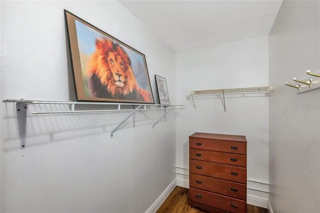 a bathroom with a sink mirror vanity and toilet