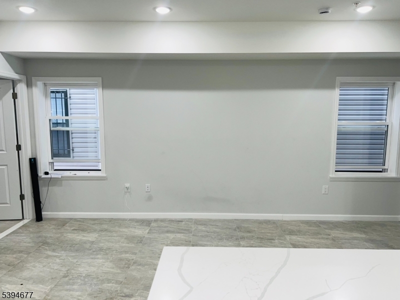 67 Wainwright Street, Unit 1 Newark, NJ 07112 - Photo 4 of 9 a view of a room with a window