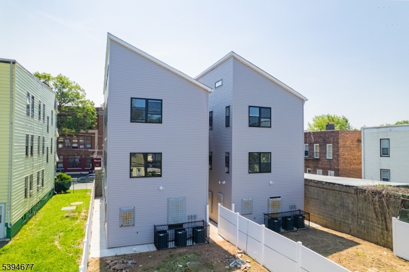 67 Wainwright Street, Unit 1 Newark, NJ 07112 - Photo 9 of 9 a house view with a backyard space