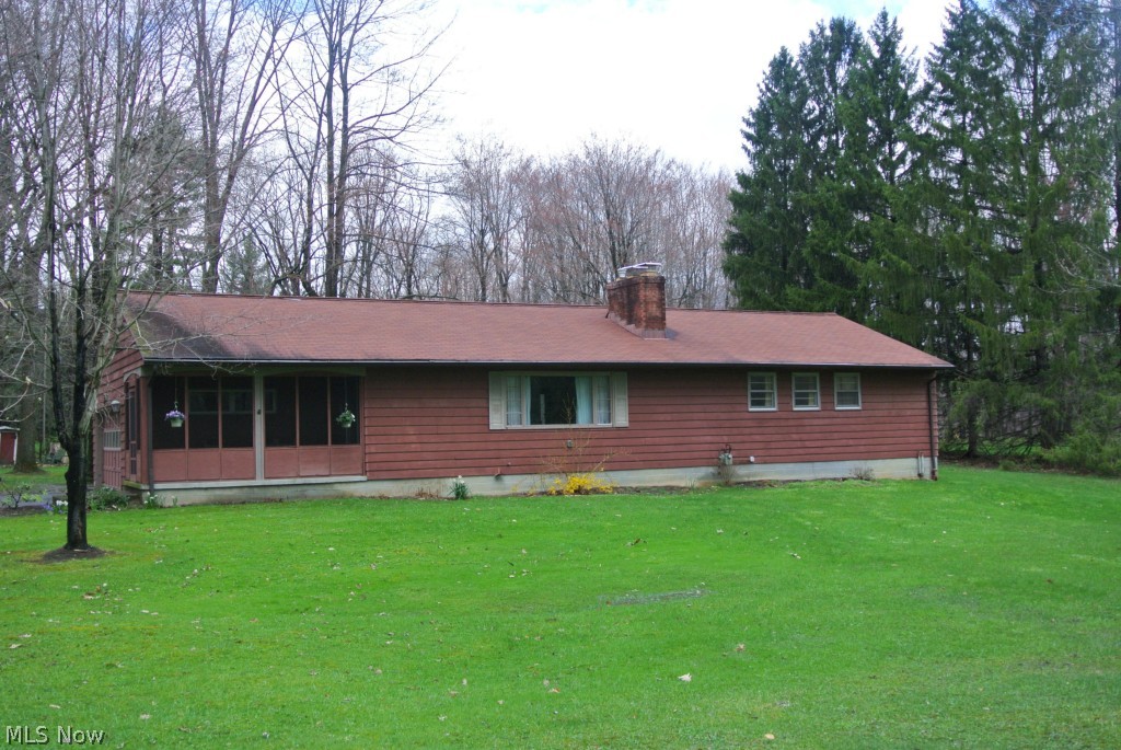 8 Overlook Road Bentleyville, OH 44022 - Photo 2 of 14 Wood siding , newer roof, lush greenlawn