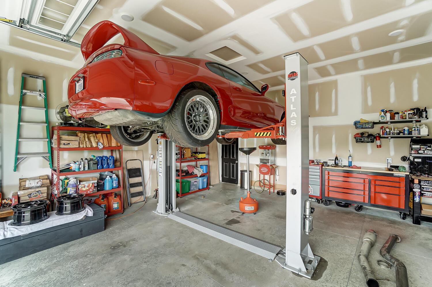5181 Carters Corner Road Sunbury, OH 43074 - Photo 65 of 74 Heated Garage with 2 post car lift