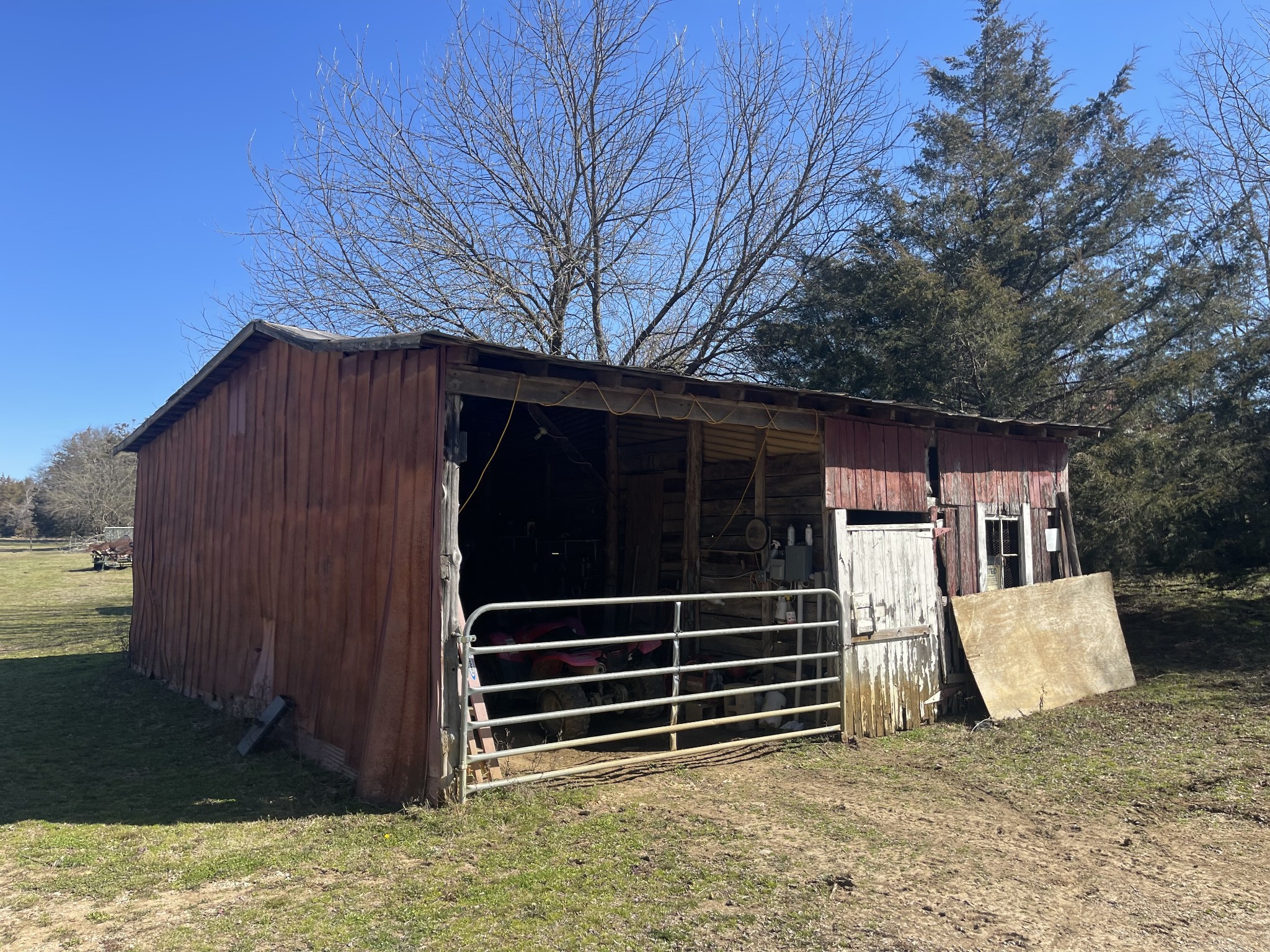 2520 Brown Shop Road Petersburg, TN 37144 - Photo 26 of 30 a view of backyard with wooden fence and a large tree