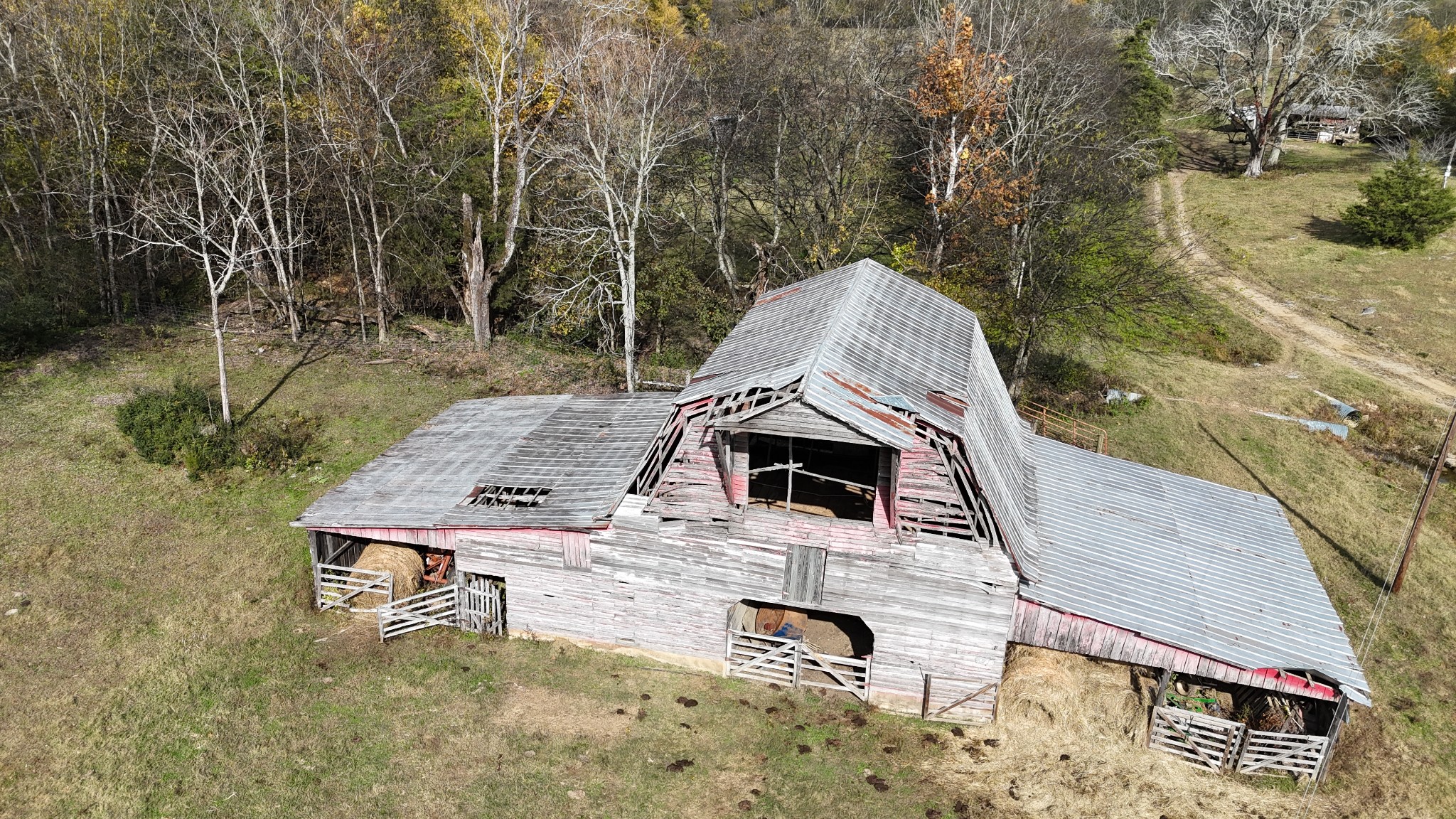 2520 Brown Shop Road Petersburg, TN 37144 - Photo 5 of 30 a view of a roof deck with table and chairs a barbeque