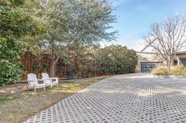 a view of a patio with a yard