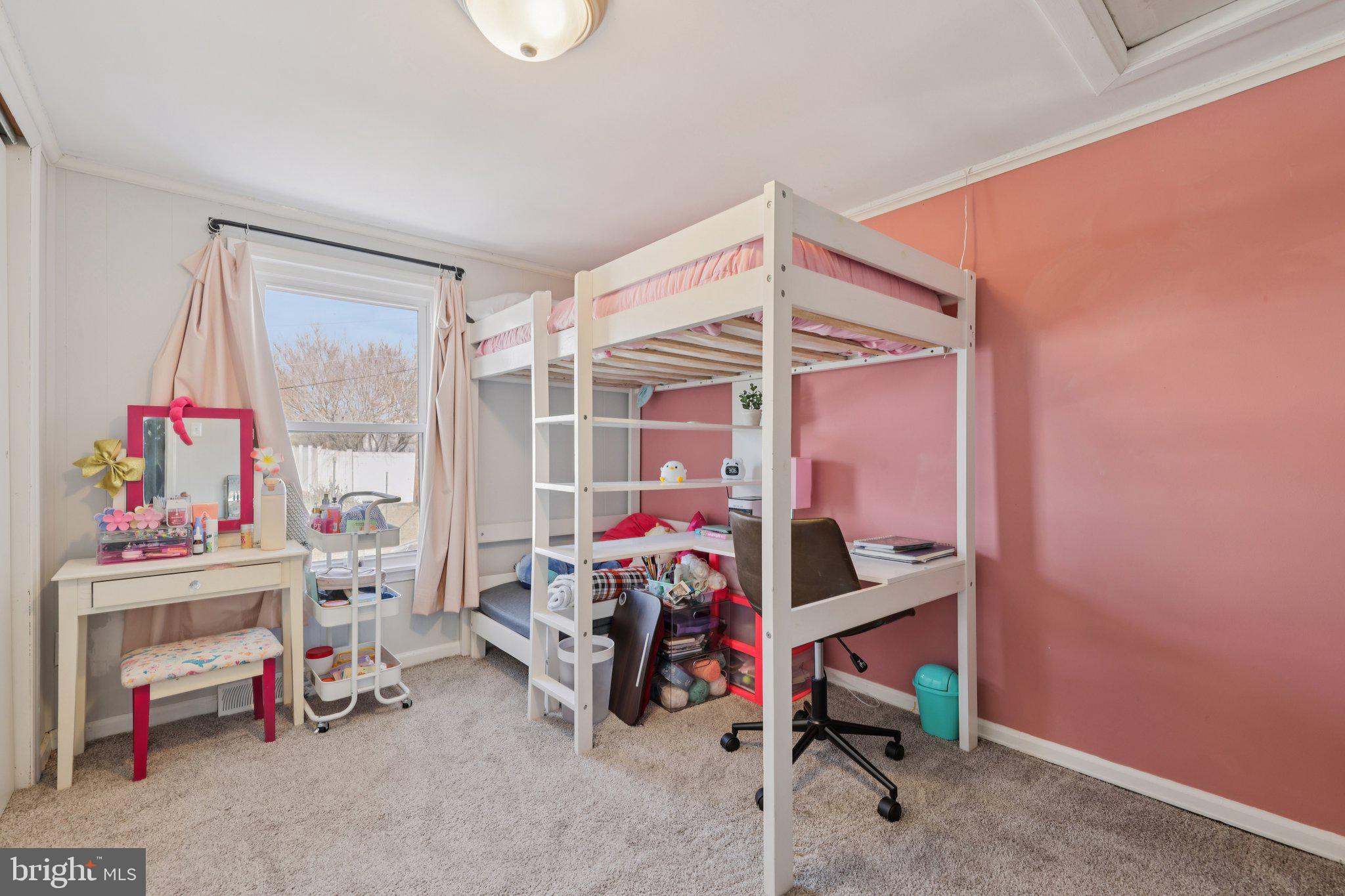 519 North Maple Avenue Brunswick, MD 21716 - Photo 17 of 26 a bedroom with furniture and a window