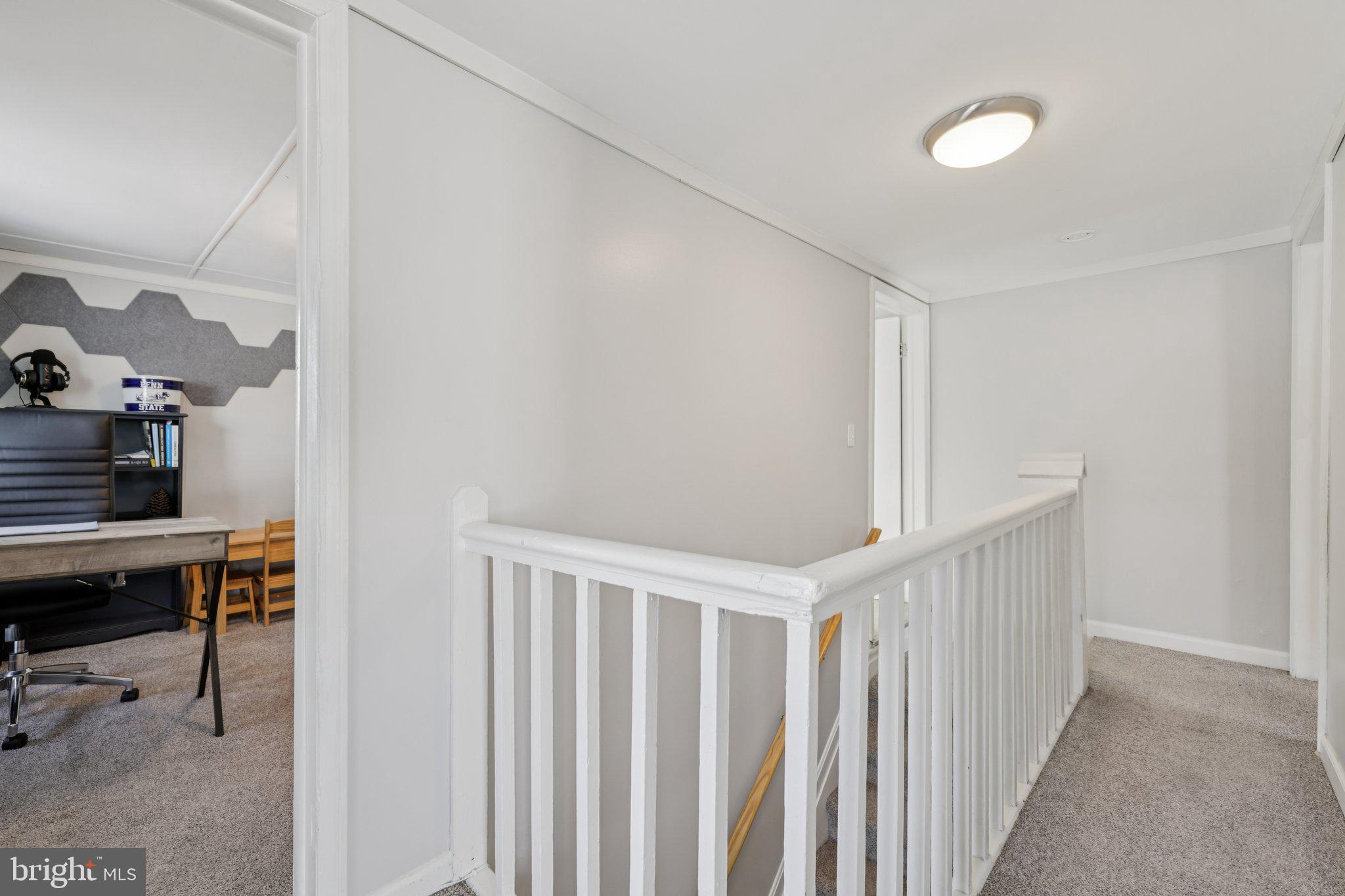519 North Maple Avenue Brunswick, MD 21716 - Photo 21 of 26 a view of a hallway with workspace