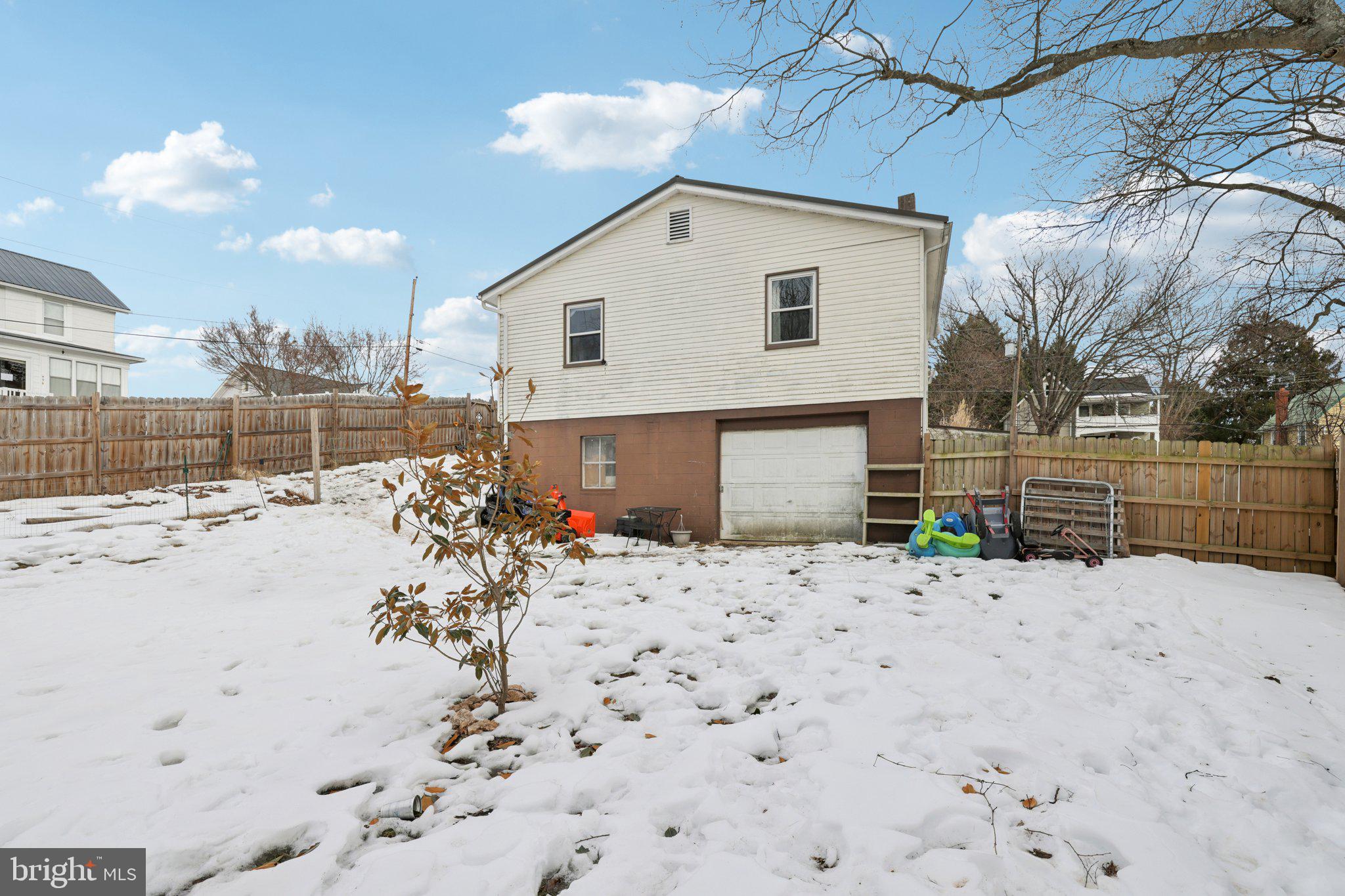 519 North Maple Avenue Brunswick, MD 21716 - Photo 24 of 26 a view of a house with a yard