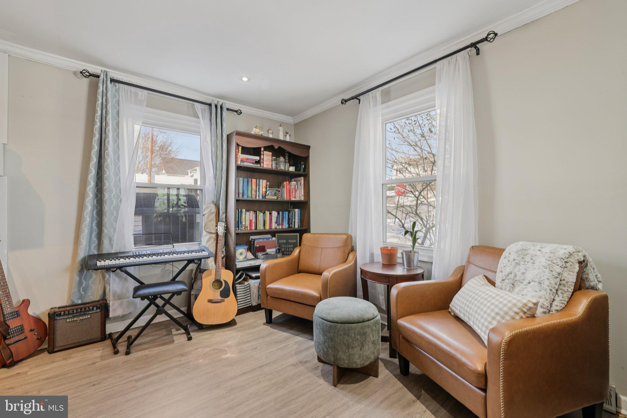 519 North Maple Avenue Brunswick, MD 21716 - Photo 3 of 26 a living room with furniture and a window