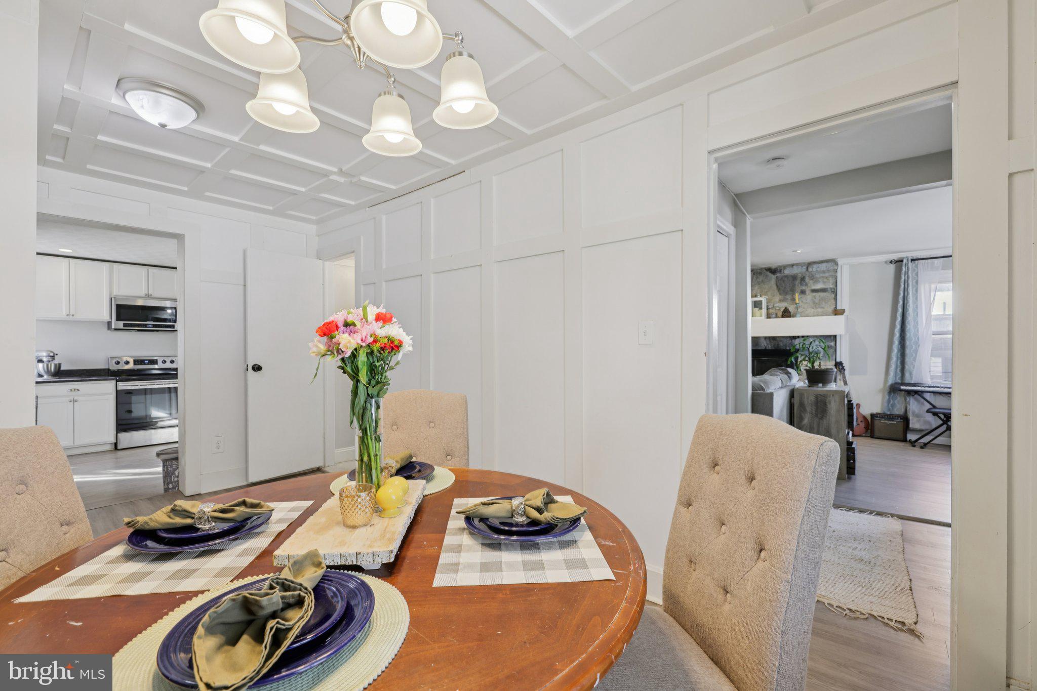 519 North Maple Avenue Brunswick, MD 21716 - Photo 8 of 26 a room with furniture and a chandelier