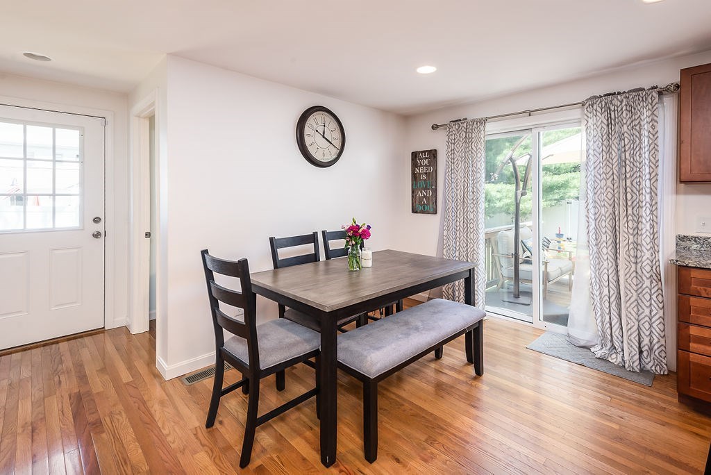 34 Bourne Avenue, Unit A Attleboro, MA 02703 - Photo 12 of 35 a view of a dining room with furniture window and wooden floor