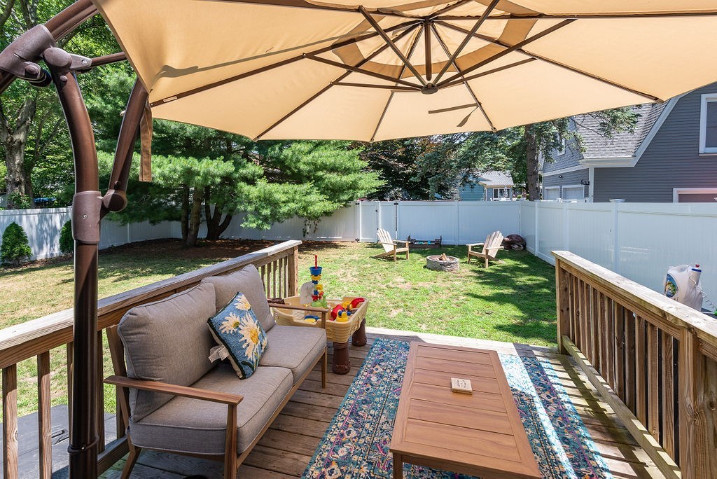34 Bourne Avenue, Unit A Attleboro, MA 02703 - Photo 13 of 35 a view of yard from deck with patio