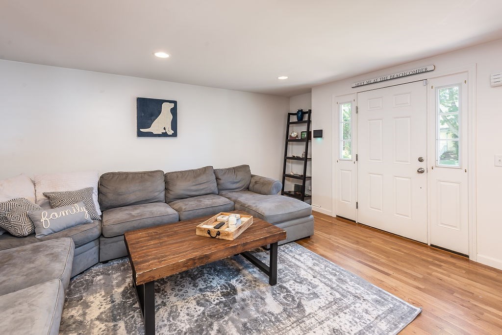 34 Bourne Avenue, Unit A Attleboro, MA 02703 - Photo 14 of 35 a living room with furniture and a rug