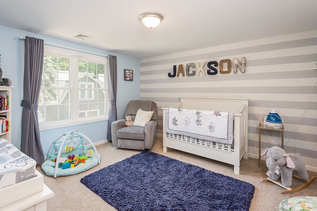 34 Bourne Avenue, Unit A Attleboro, MA 02703 - Photo 23 of 35 a living room with furniture and a couch