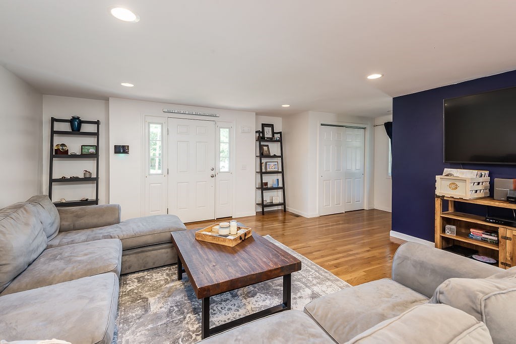 34 Bourne Avenue, Unit A Attleboro, MA 02703 - Photo 4 of 35 a living room with furniture and a flat screen tv