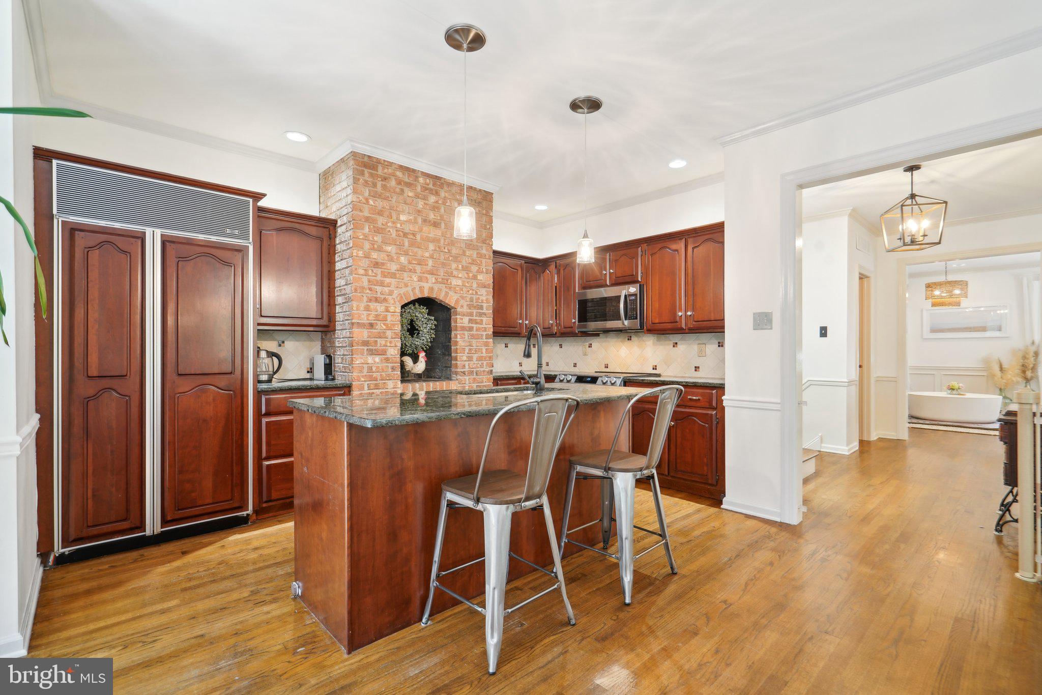 49 Sentinel Road Washington Crossing, PA 18977 - Photo 31 of 42 Kitchen with island and built in refrigerator