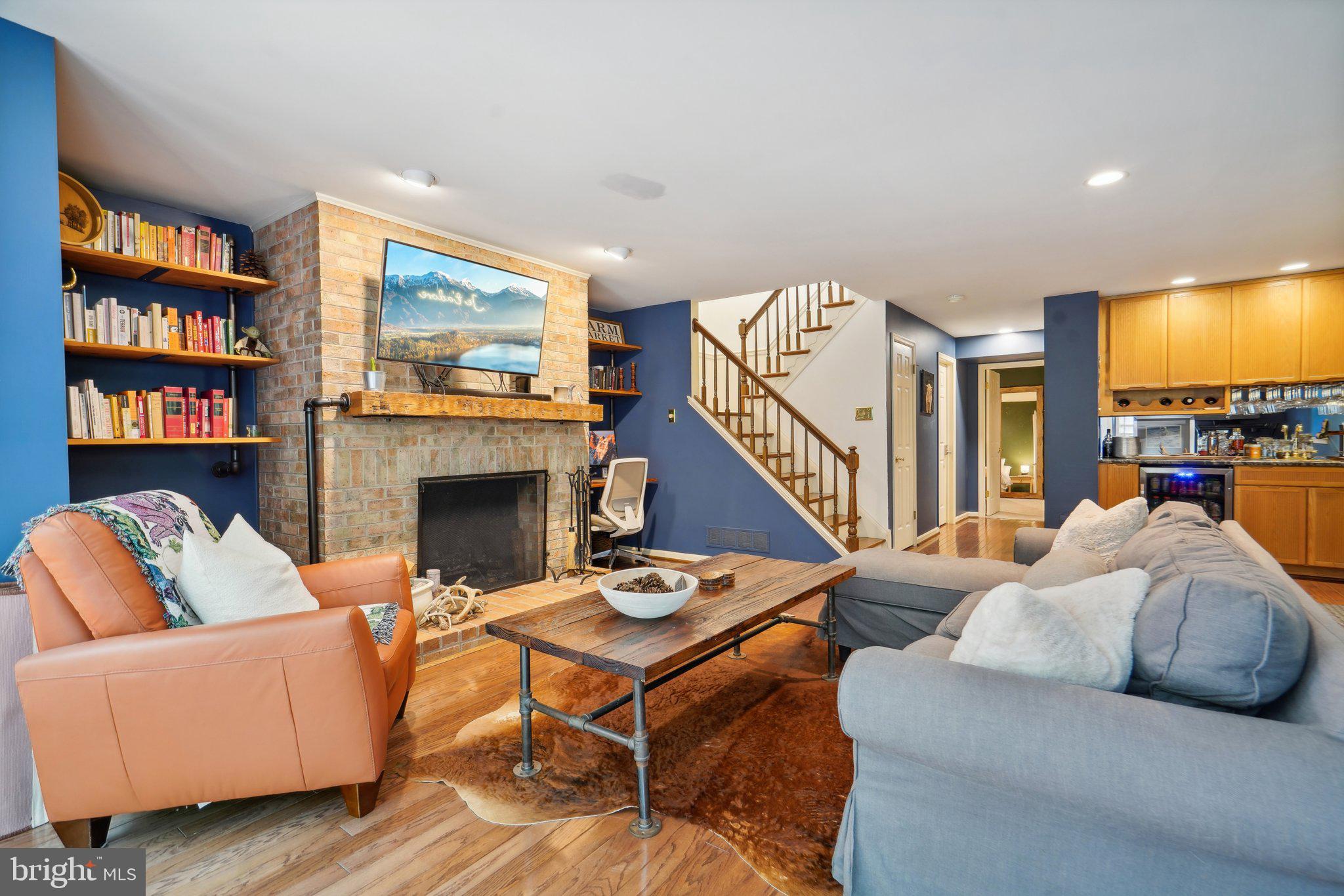 49 Sentinel Road Washington Crossing, PA 18977 - Photo 7 of 42 Family room w/ wood burning fireplace, lower level