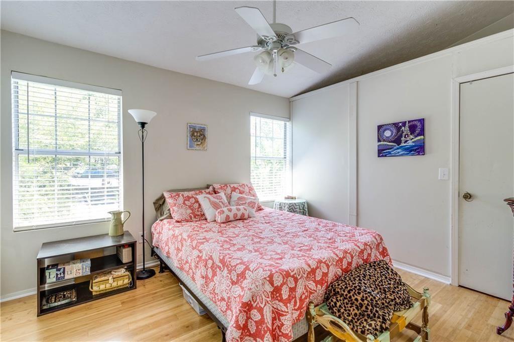 2104 Queen Anne Court Sandy Springs, GA 30350 - Photo 11 of 29 a bedroom with a bed and a window