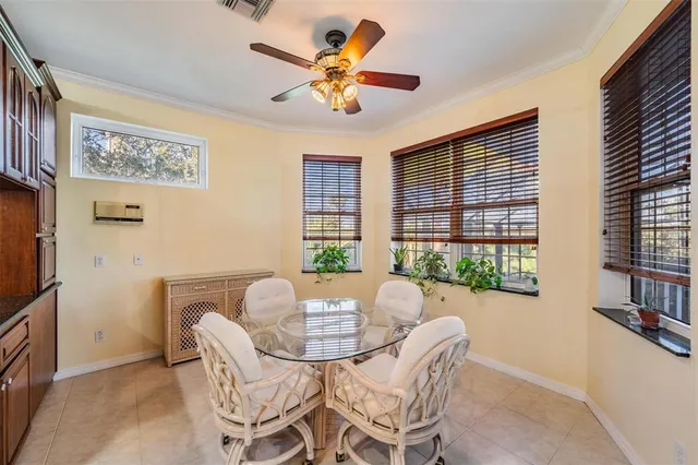 a open kitchen with stainless steel appliances granite countertop a stove and cabinets