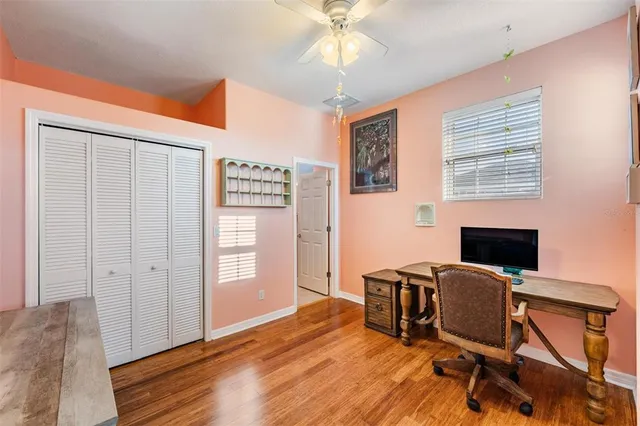a view of a swimming pool with a patio