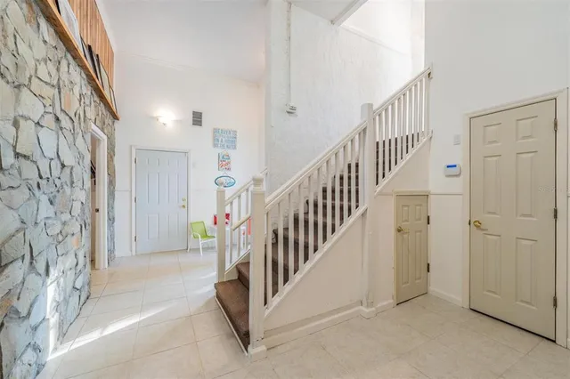 a view of a backyard with a swimming pool