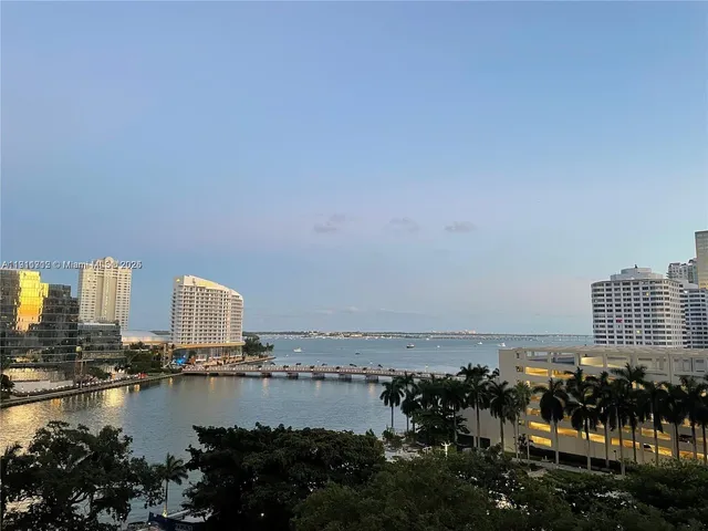 a view of a city and ocean