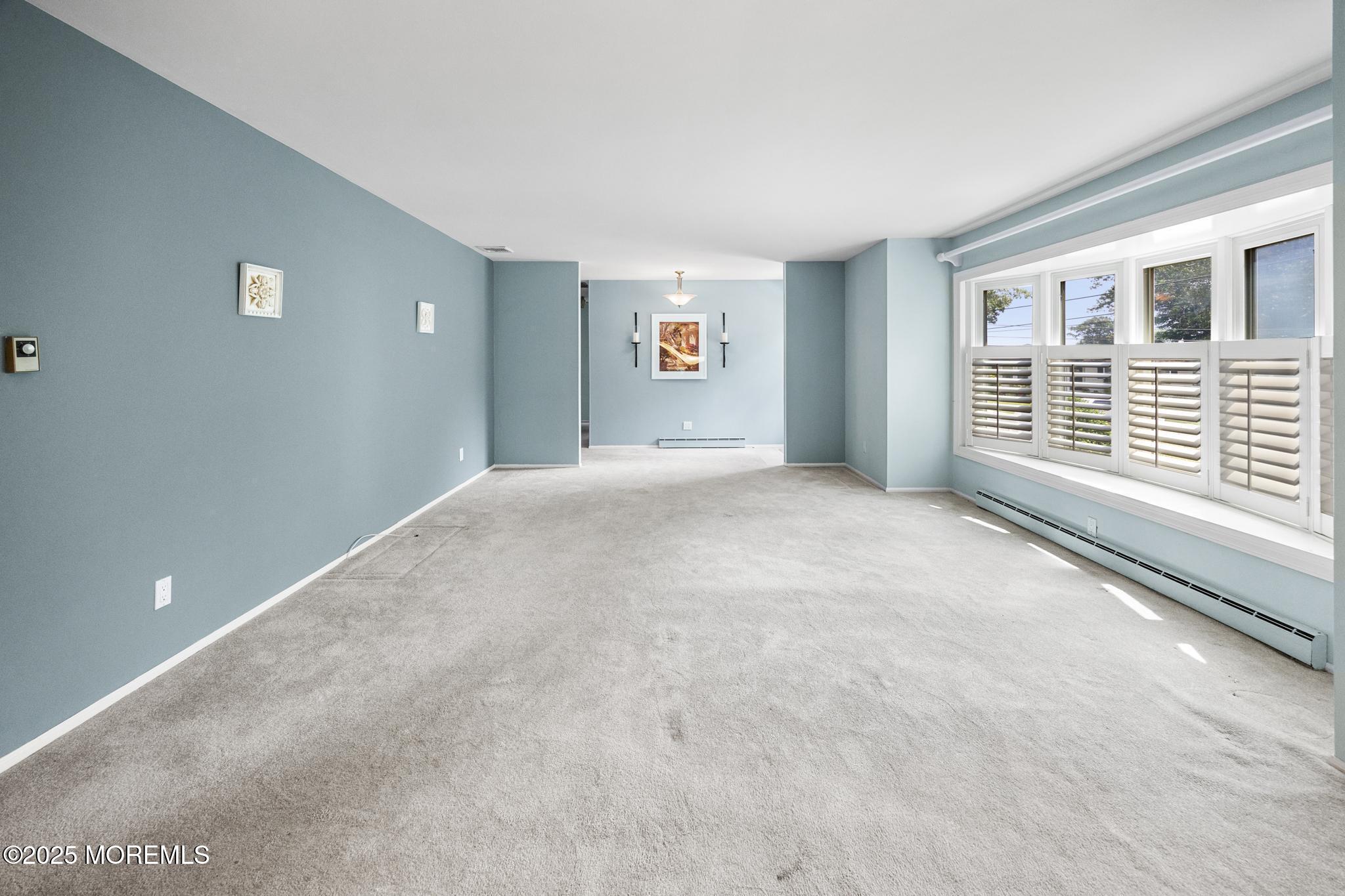 65 Pineland Road Brick, NJ 08724 - Photo 11 of 47 a view of an empty room with a window