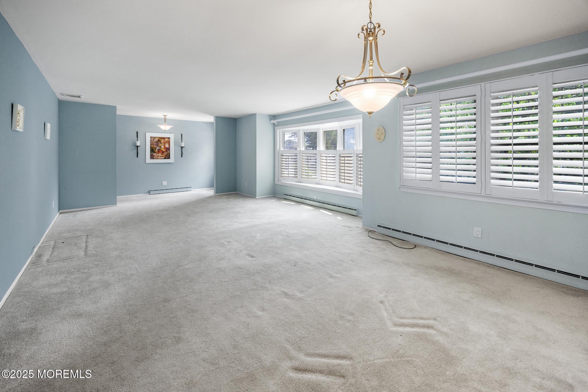 65 Pineland Road Brick, NJ 08724 - Photo 13 of 47 a view of an empty room with a window