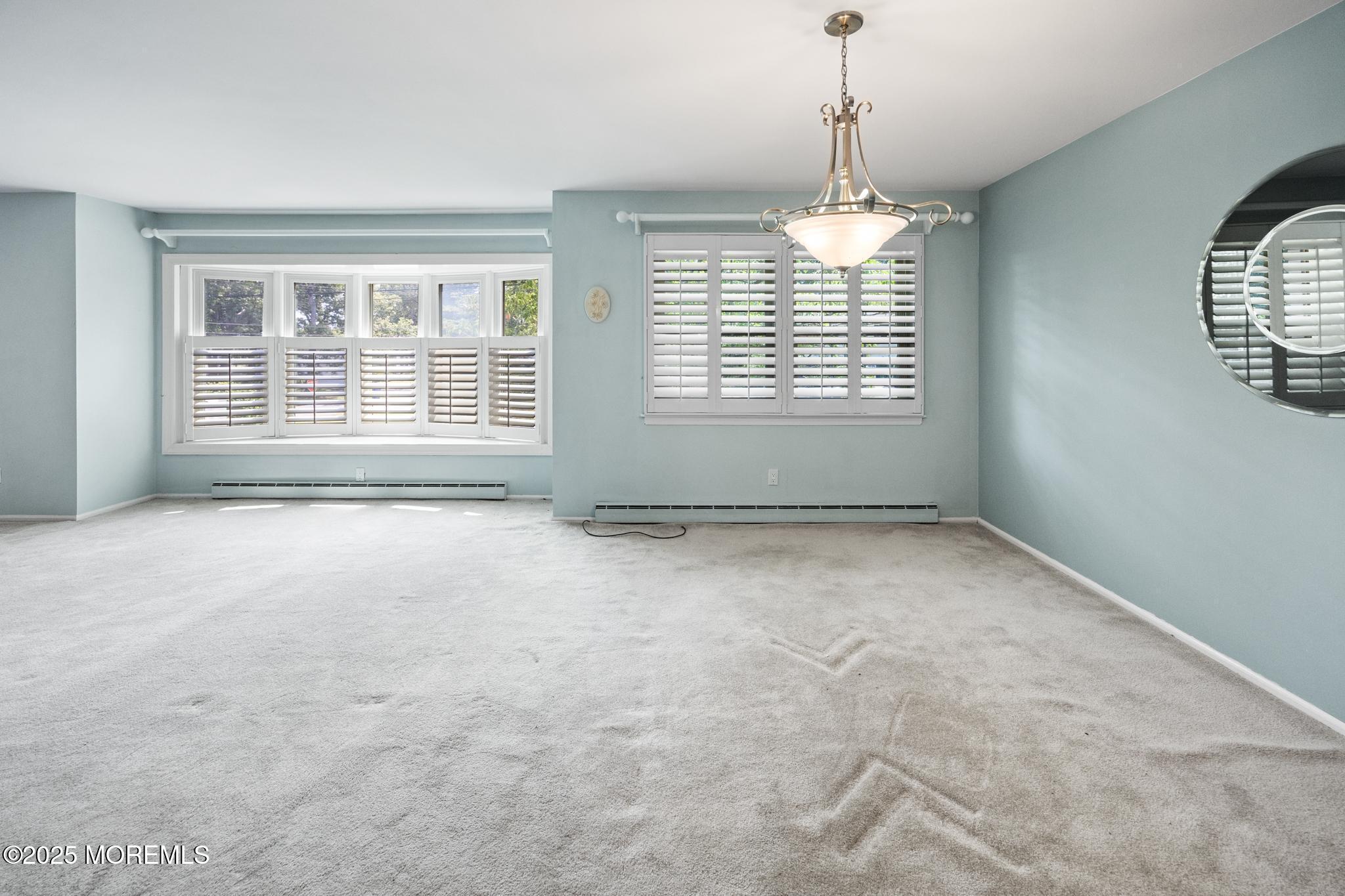 65 Pineland Road Brick, NJ 08724 - Photo 14 of 47 a view of an empty room with a window