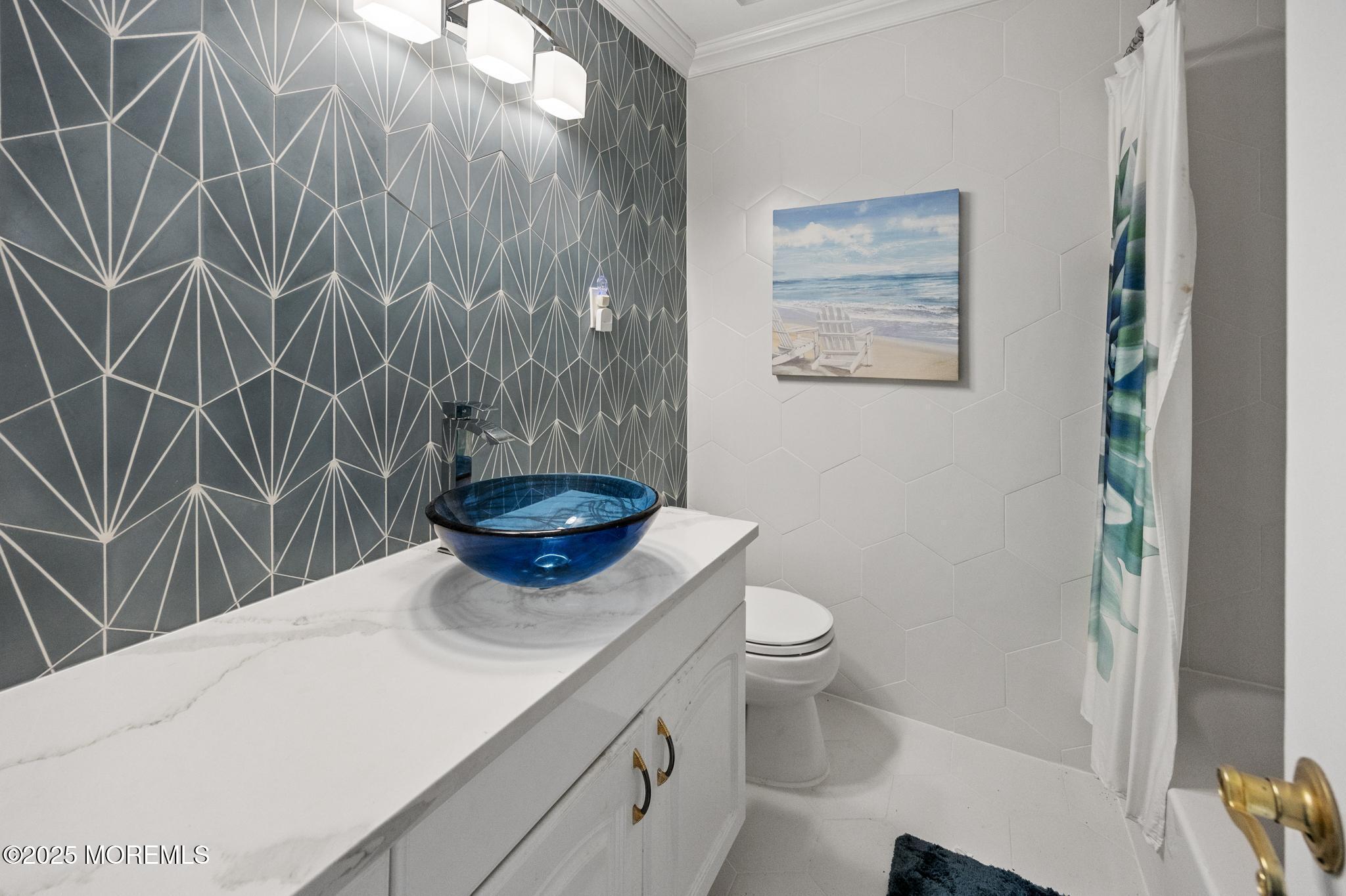 65 Pineland Road Brick, NJ 08724 - Photo 24 of 47 a bathroom with a sink a toilet and a shower