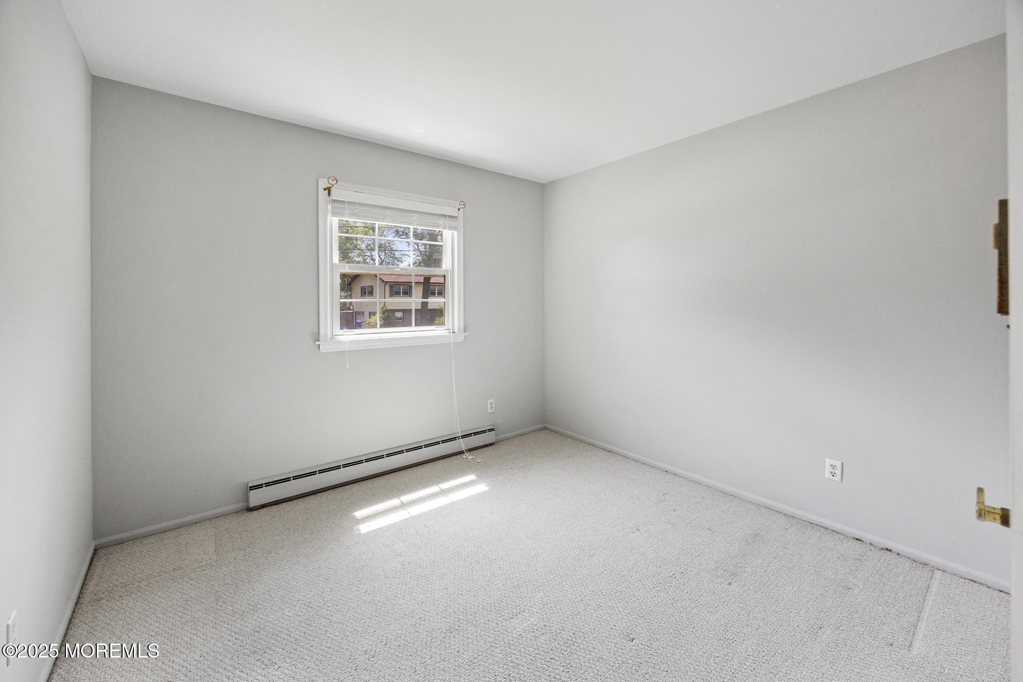 65 Pineland Road Brick, NJ 08724 - Photo 25 of 47 an empty room with a workbench