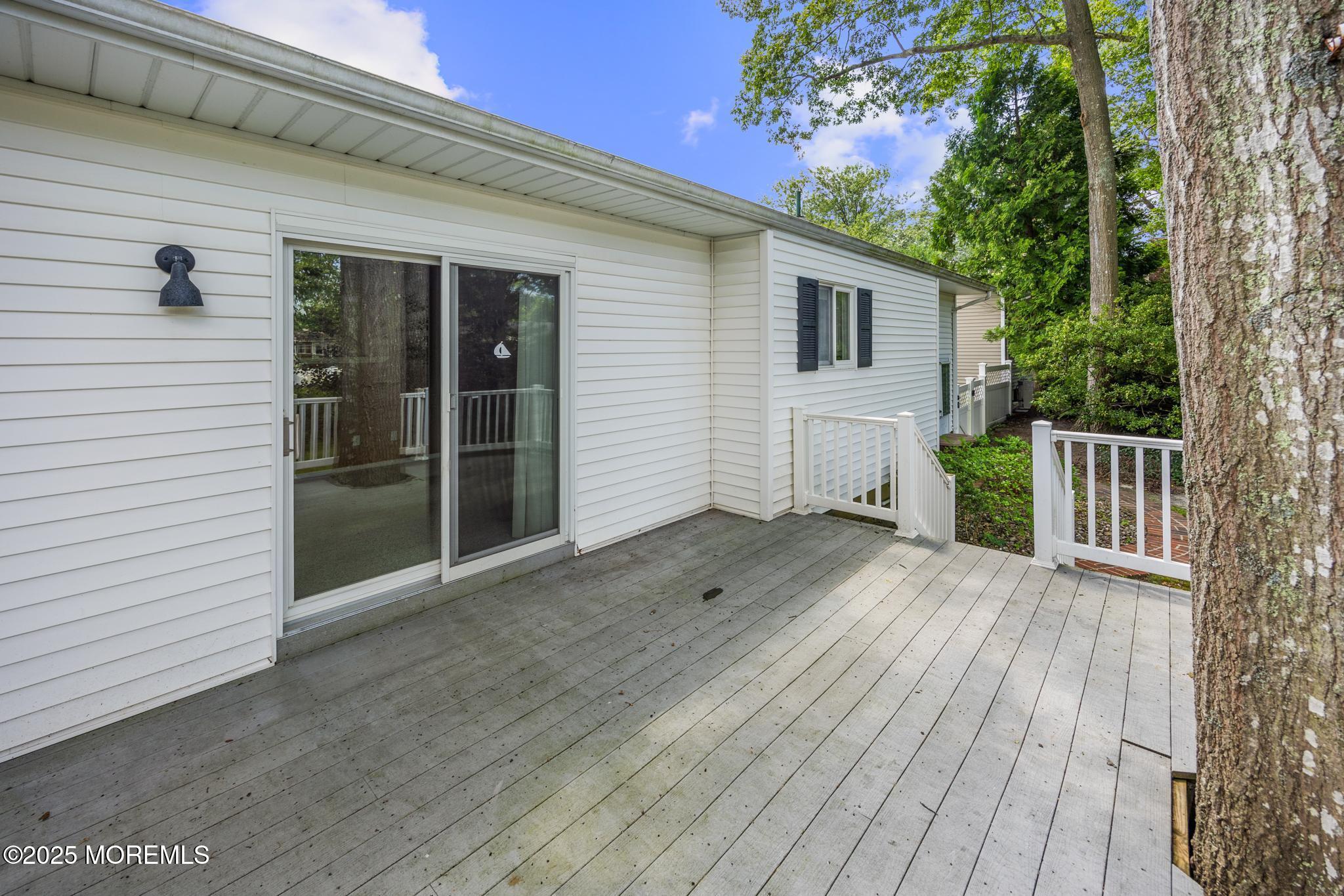 65 Pineland Road Brick, NJ 08724 - Photo 36 of 47 a view of a house with a deck