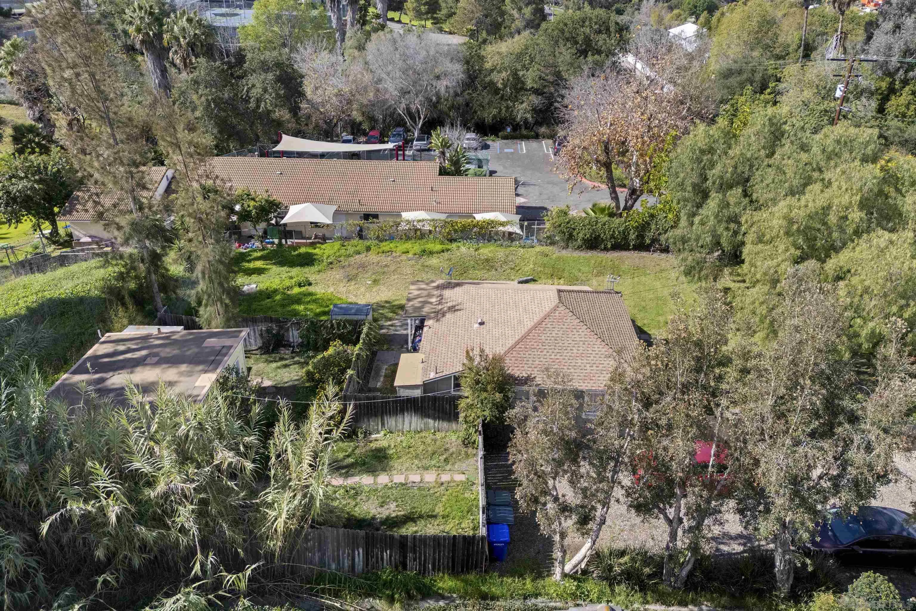 803 Taylor Street Vista, CA 92084 - Photo 12 of 19 a aerial view of a house with a yard and lake view