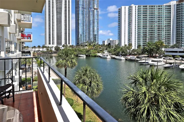 a view of swimming pool from a balcony