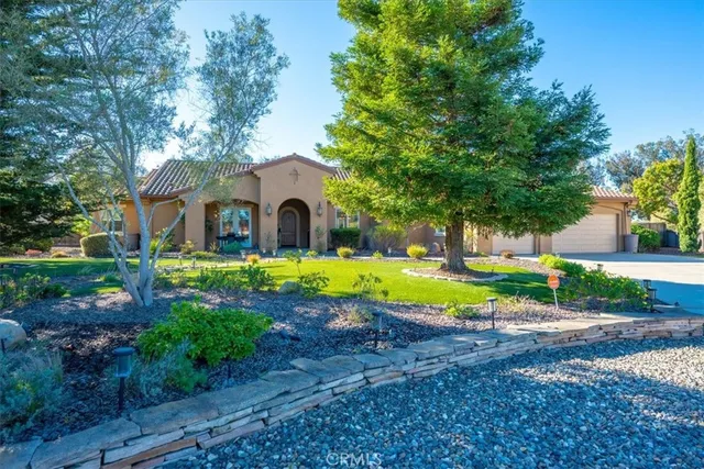 a view of backyard with swimming pool