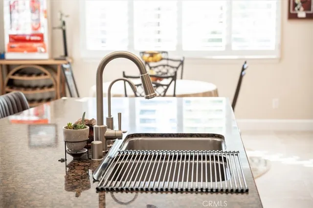 a bed room with two bed and a television