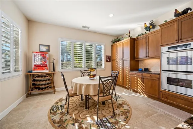 a spacious bathroom with a sink mirror and a bathtub