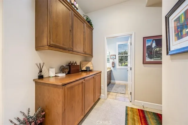 a view of a house with backyard porch and sitting area