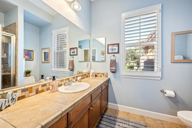 a view of a backyard with sitting area